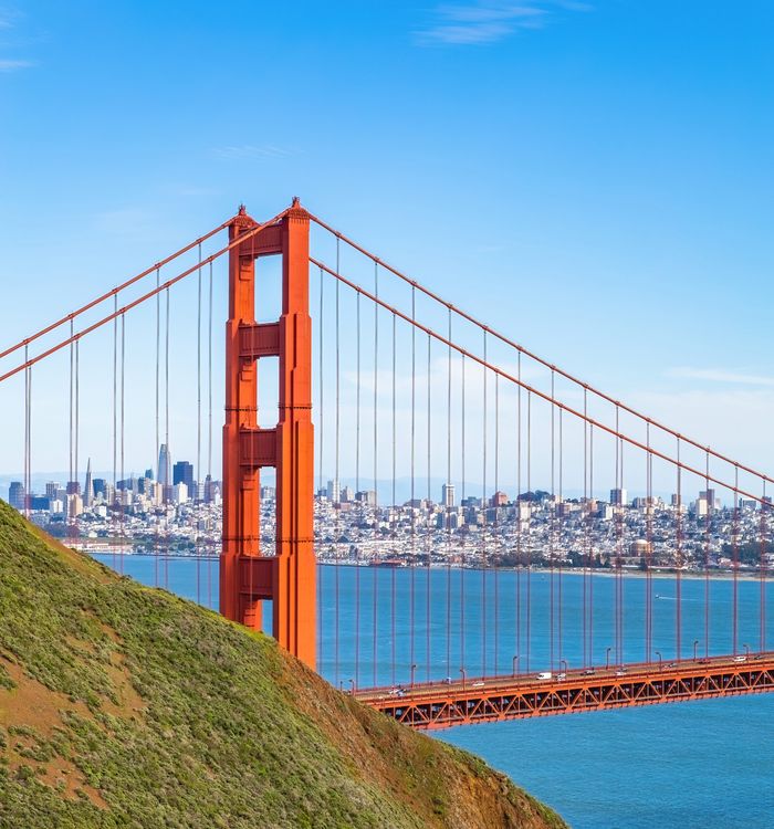 services-02 Iconic Golden Gate Bridge over San Francisco Bay on a clear day showcasing the vibrant cityscape.