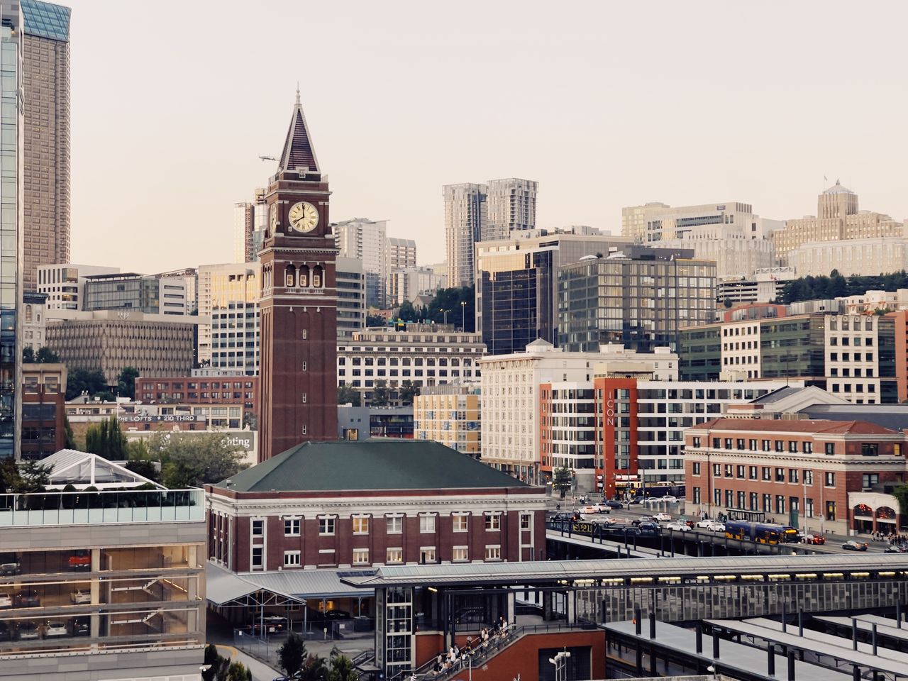 gallery-04 A scenic view of Seattle's downtown skyline featuring the historic Smith Tower with modern urban architecture.