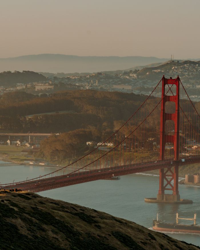 services-03 Scenic sunrise view of the Golden Gate Bridge spanning the San Francisco Bay.